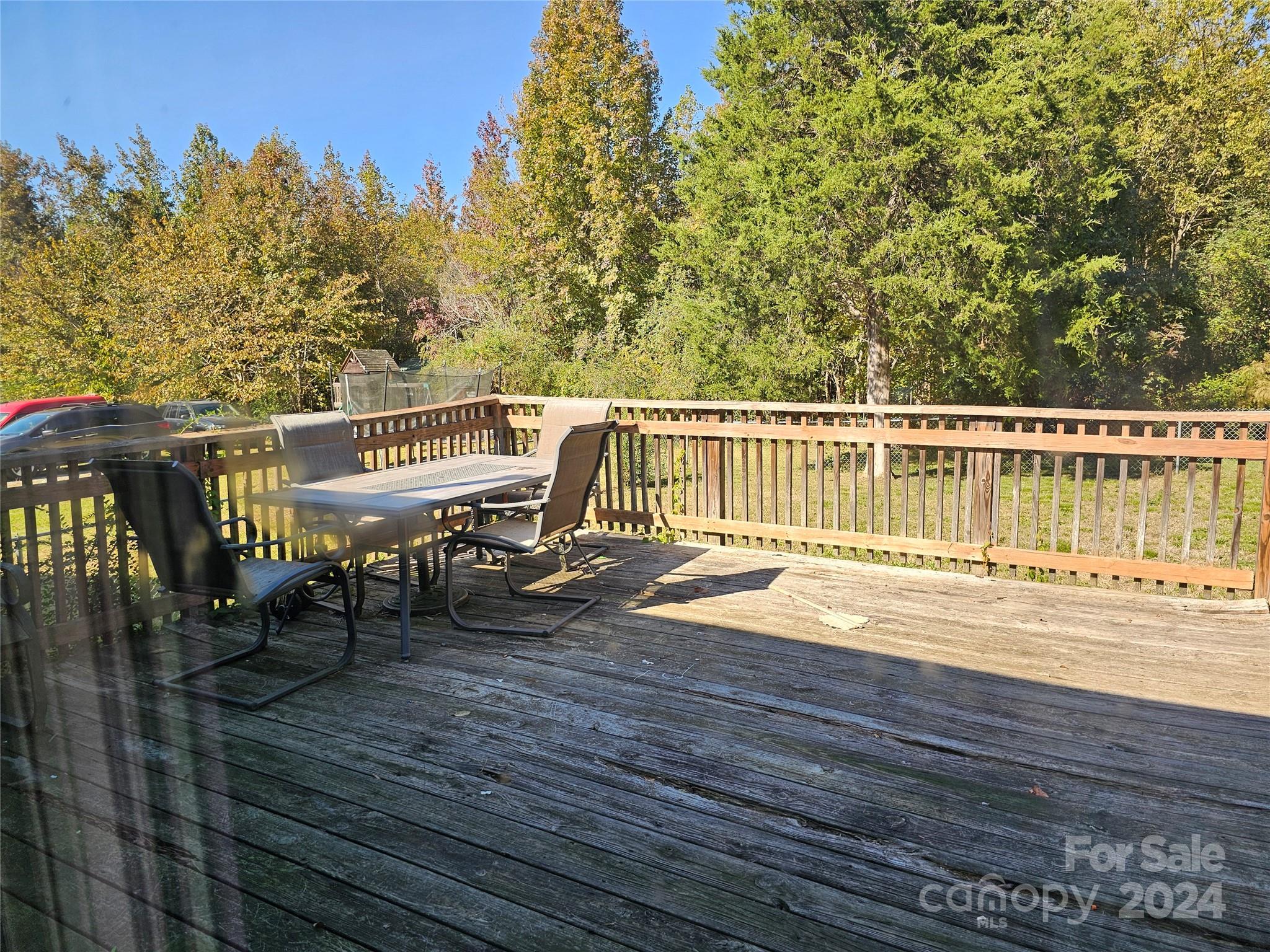 2702 University Drive Lancaster, SC 29720 - Photo 9 of 17 a view of a balcony with wooden floor and outdoor seating