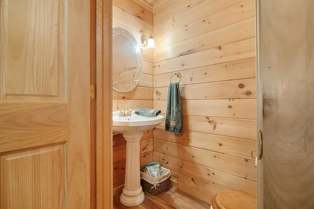 a bathroom with a toilet and shower