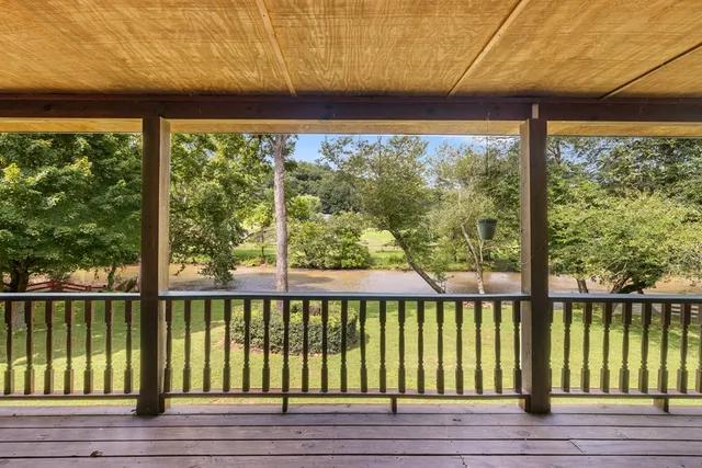 a view of a city street from a balcony