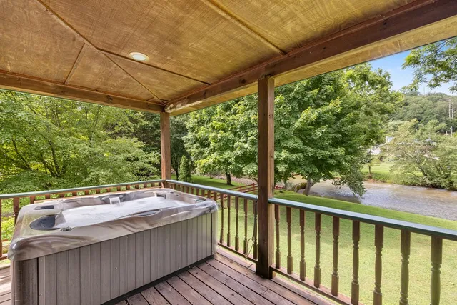a view of a two chairs in the balcony