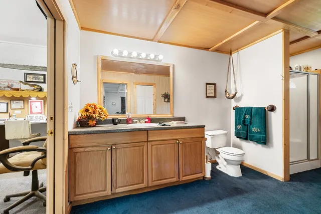 a view of a porch with table and chairs