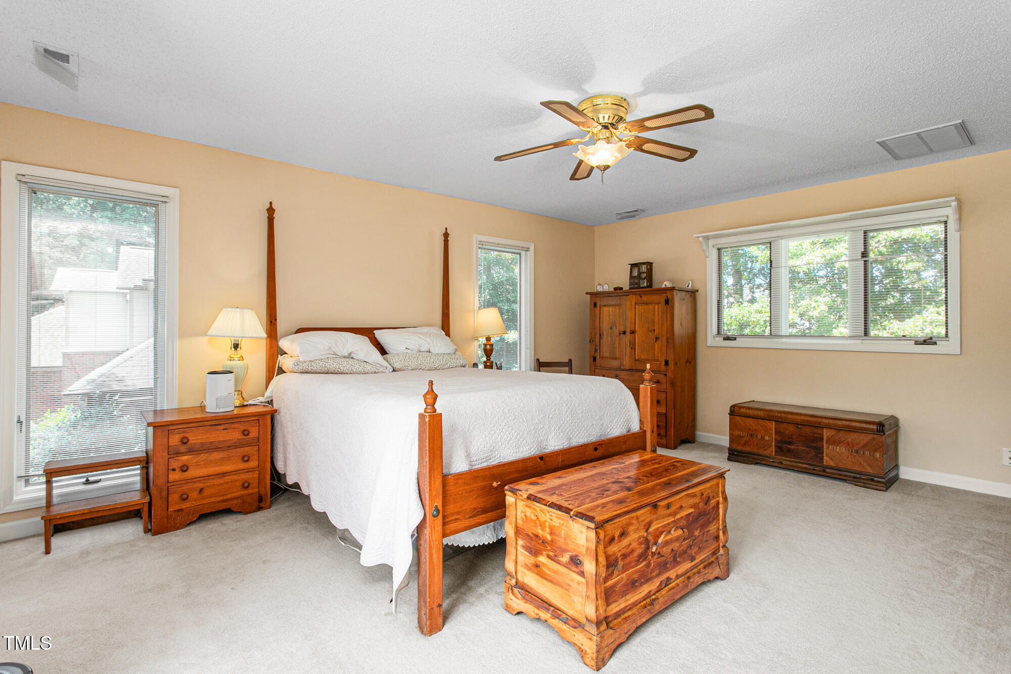 809 Brookview Drive Elon, NC 27244 - Photo 24 of 53 a bedroom with bed and window