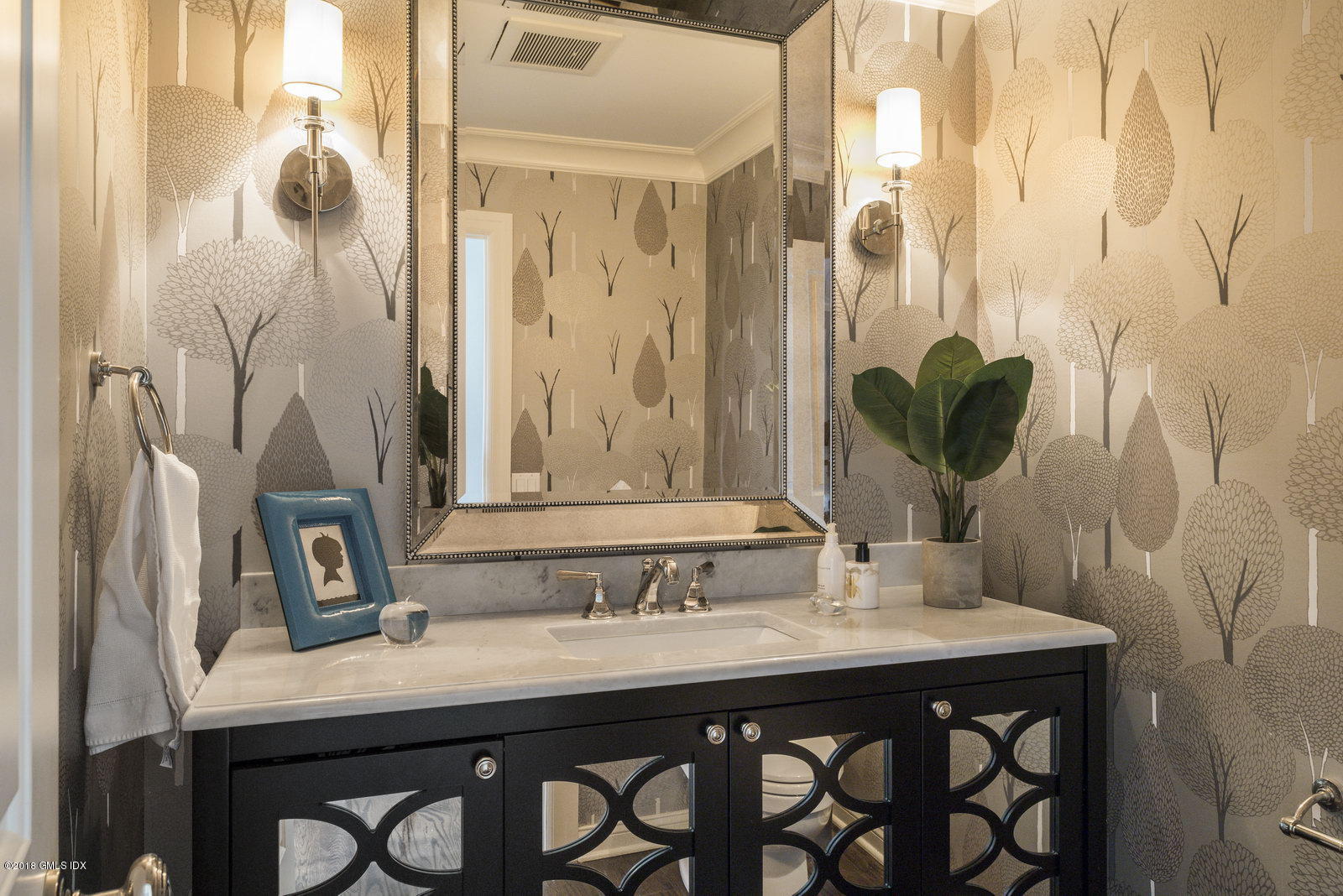 341 Stanwich Road Greenwich, CT 06830 - Photo 13 of 18 a bathroom with a sink and a mirror