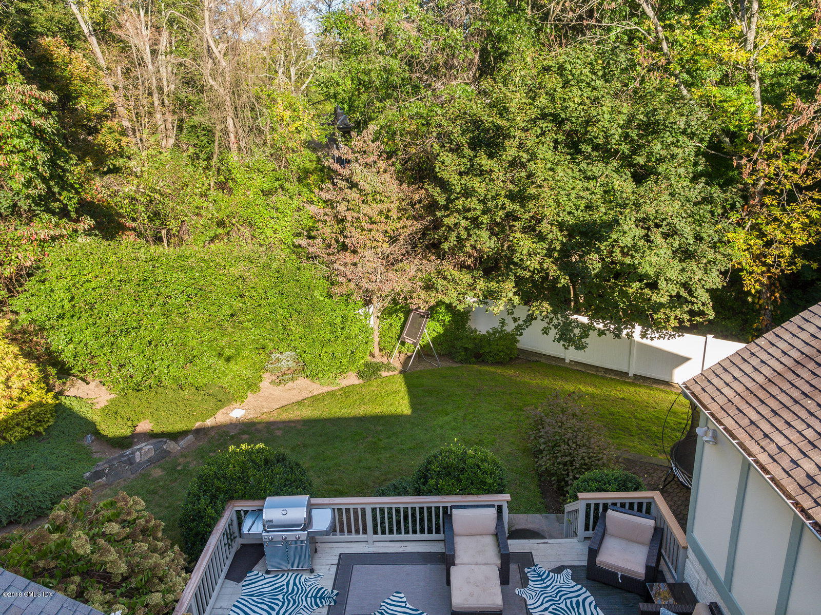 341 Stanwich Road Greenwich, CT 06830 - Photo 15 of 18 a view of a yard in front of the house