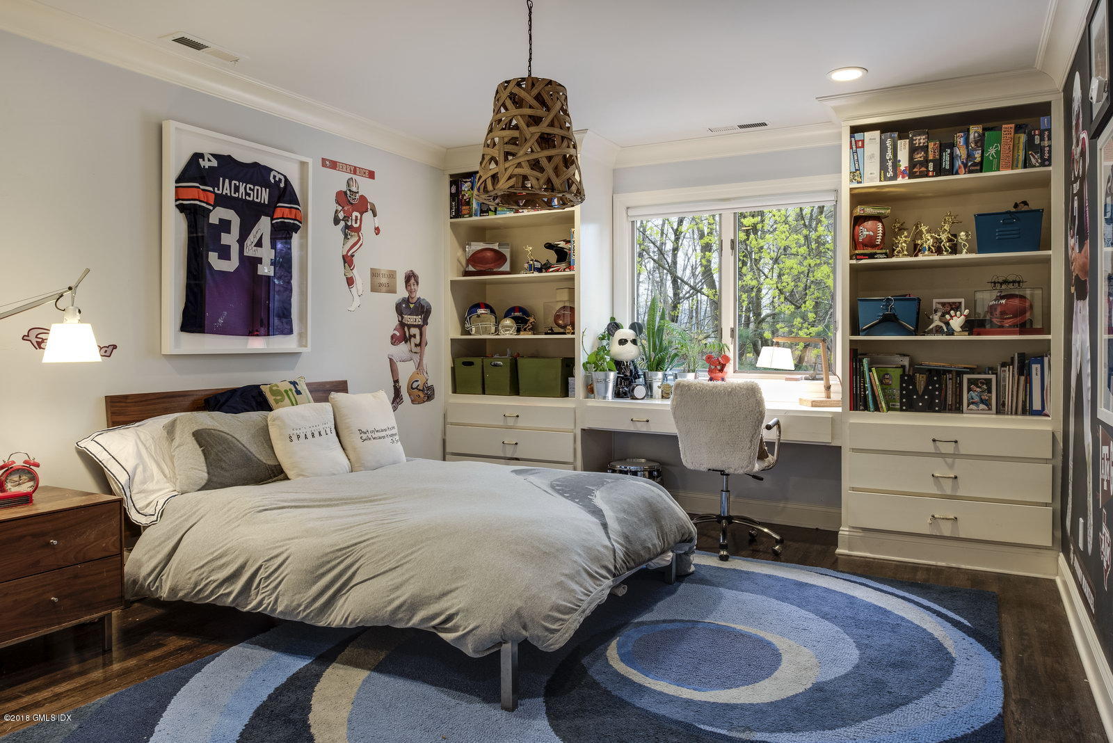 341 Stanwich Road Greenwich, CT 06830 - Photo 8 of 18 a bedroom with a bed and a window