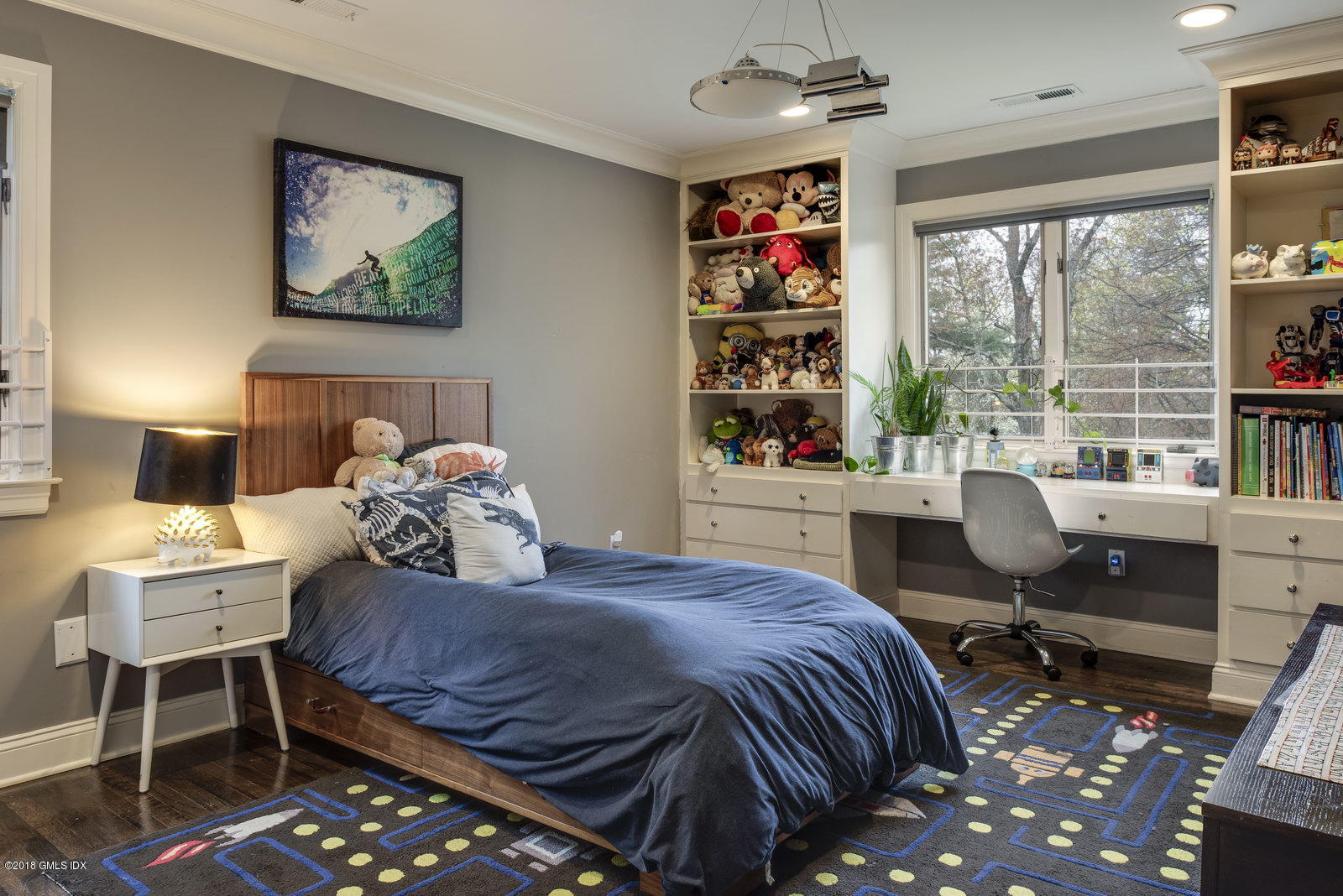 341 Stanwich Road Greenwich, CT 06830 - Photo 9 of 18 a bedroom with a bed and a desk