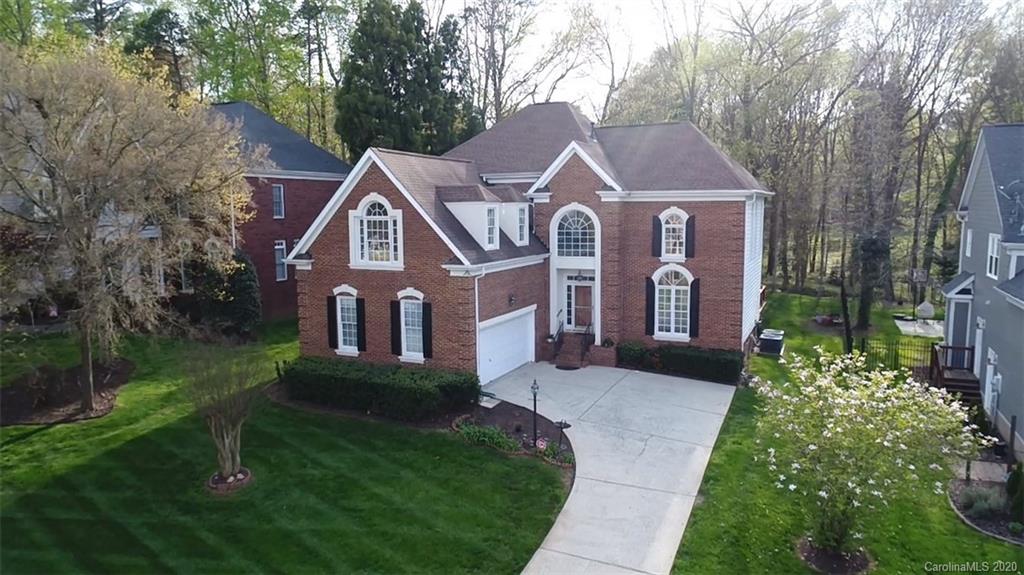 3330 Rhett Butler Place Charlotte, NC 28270 - Photo 2 of 48 a front view of a house with garden