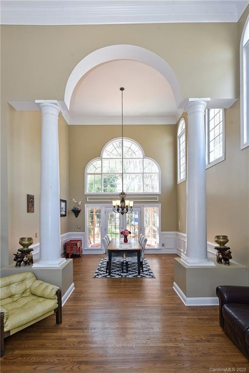 3330 Rhett Butler Place Charlotte, NC 28270 - Photo 11 of 48 a living room with furniture and a large window