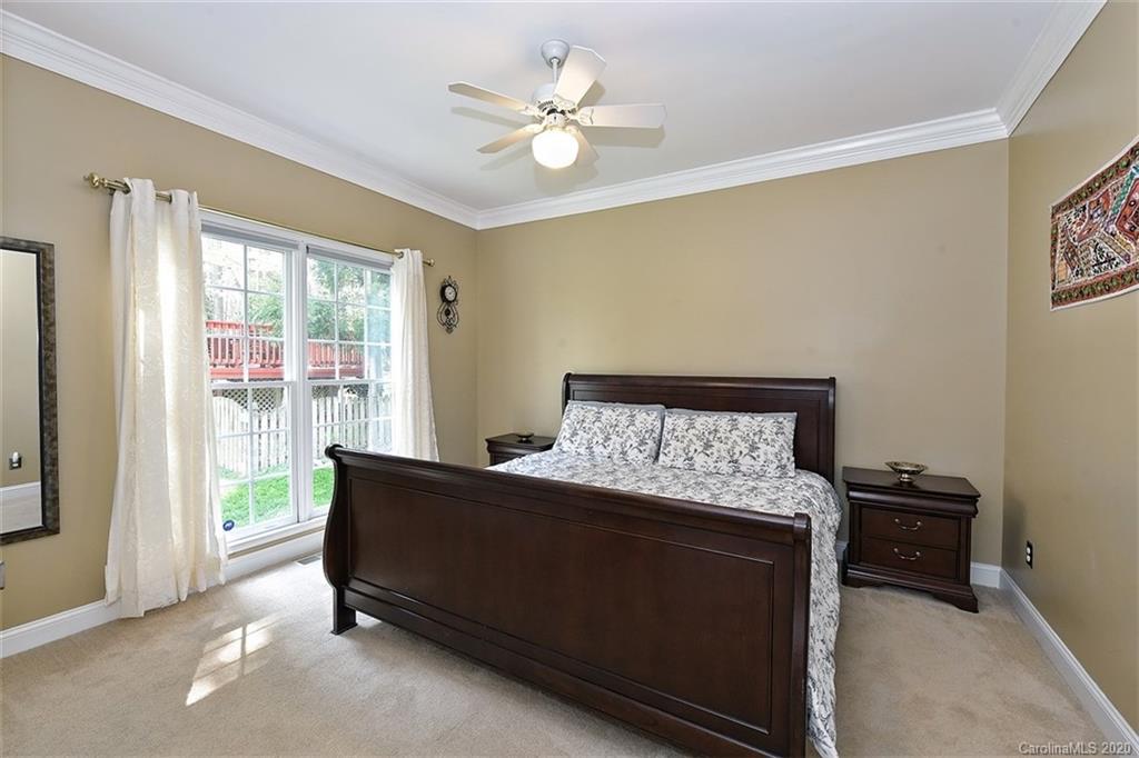 3330 Rhett Butler Place Charlotte, NC 28270 - Photo 23 of 48 a living room with furniture and a large window