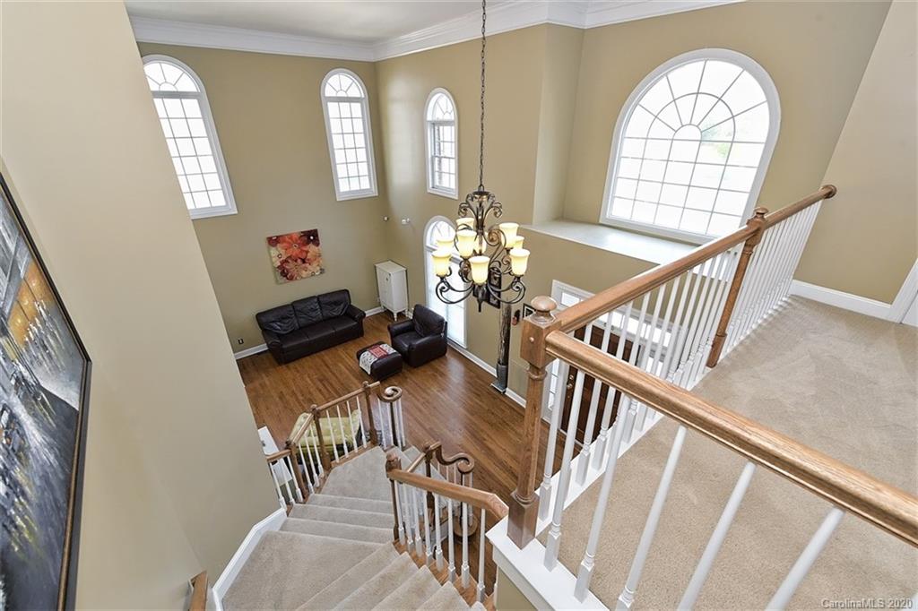 3330 Rhett Butler Place Charlotte, NC 28270 - Photo 25 of 48 a view of a livingroom with wooden floor and furniture