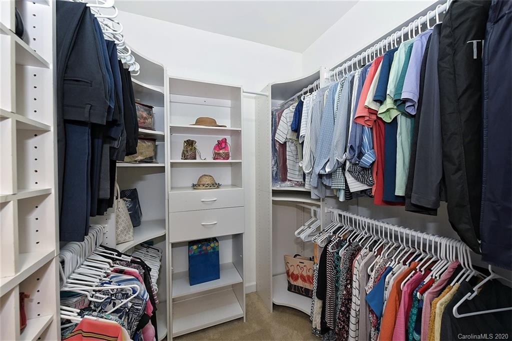 3330 Rhett Butler Place Charlotte, NC 28270 - Photo 29 of 48 a view of walk in closet with clothes and shoes