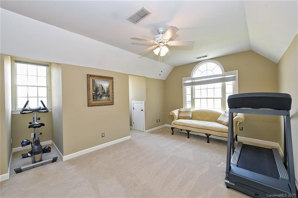 3330 Rhett Butler Place Charlotte, NC 28270 - Photo 37 of 48 a living room with furniture and a window