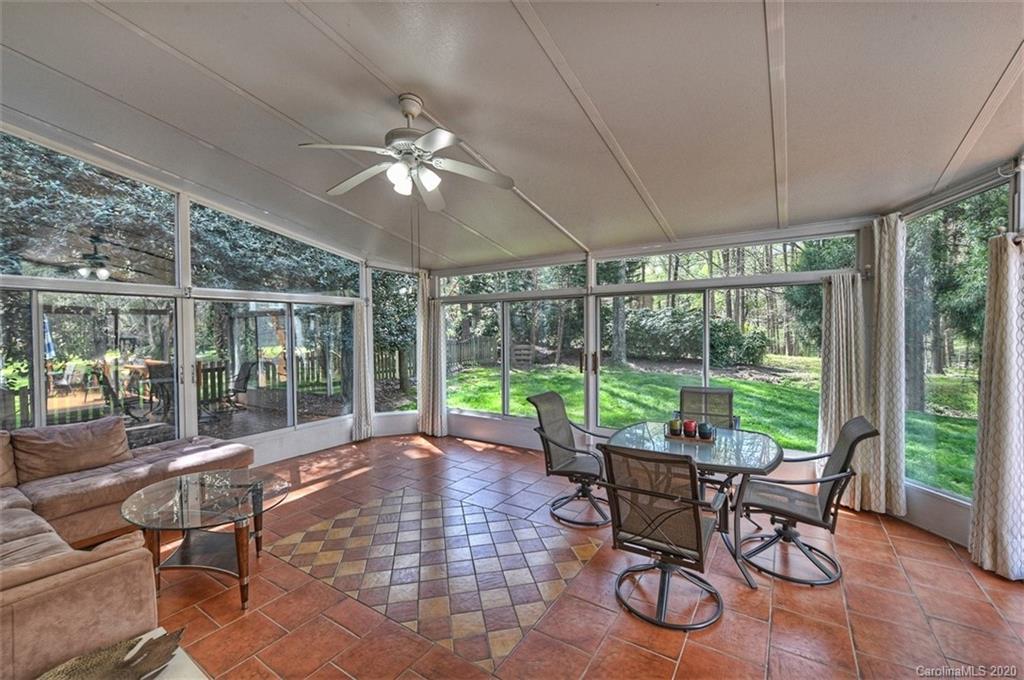 3330 Rhett Butler Place Charlotte, NC 28270 - Photo 38 of 48 a patio with yard glass top table and chairs