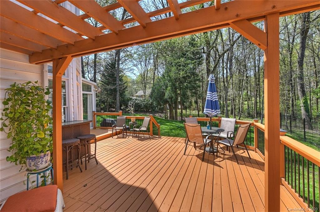 3330 Rhett Butler Place Charlotte, NC 28270 - Photo 40 of 48 a view of a patio with dining table and chairs