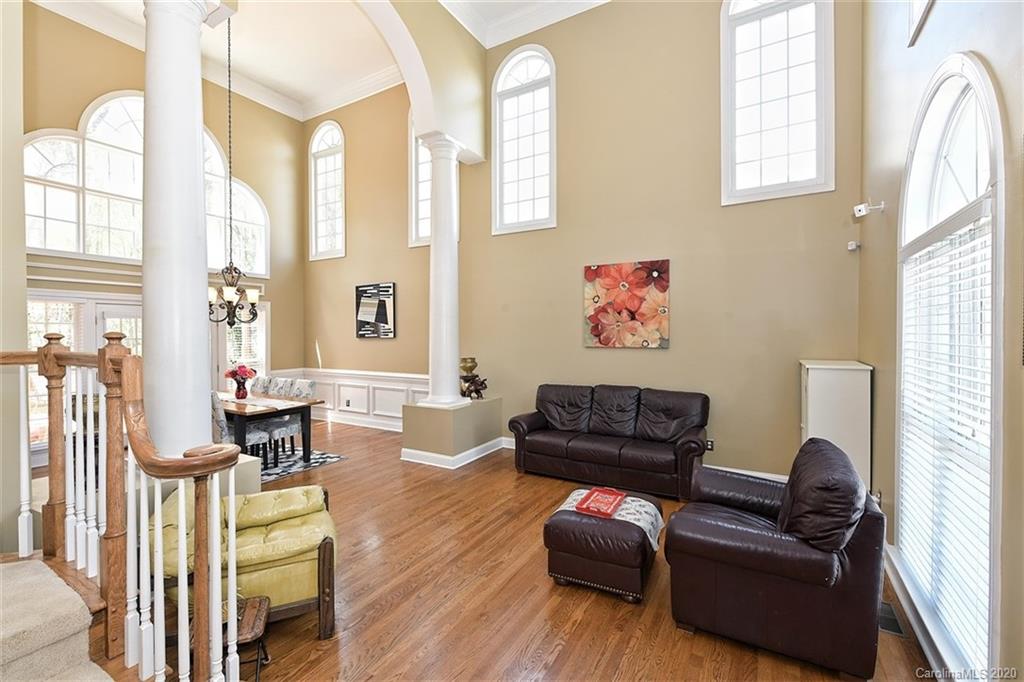 3330 Rhett Butler Place Charlotte, NC 28270 - Photo 9 of 48 a living room with furniture and a window