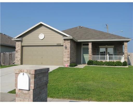 a view of outdoor space yard and front view of a house