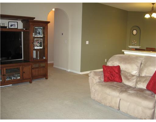 2002 Spanish Trail Corpus Christi, TX 78410 - Photo 3 of 10 a bedroom with a bed and a flat screen tv
