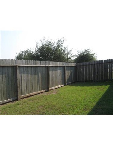 2002 Spanish Trail Corpus Christi, TX 78410 - Photo 9 of 10 a view of a backyard with large trees