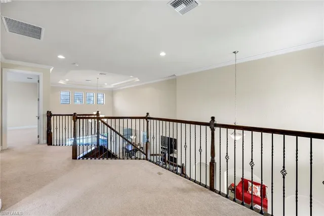 a view of staircase with rug floor