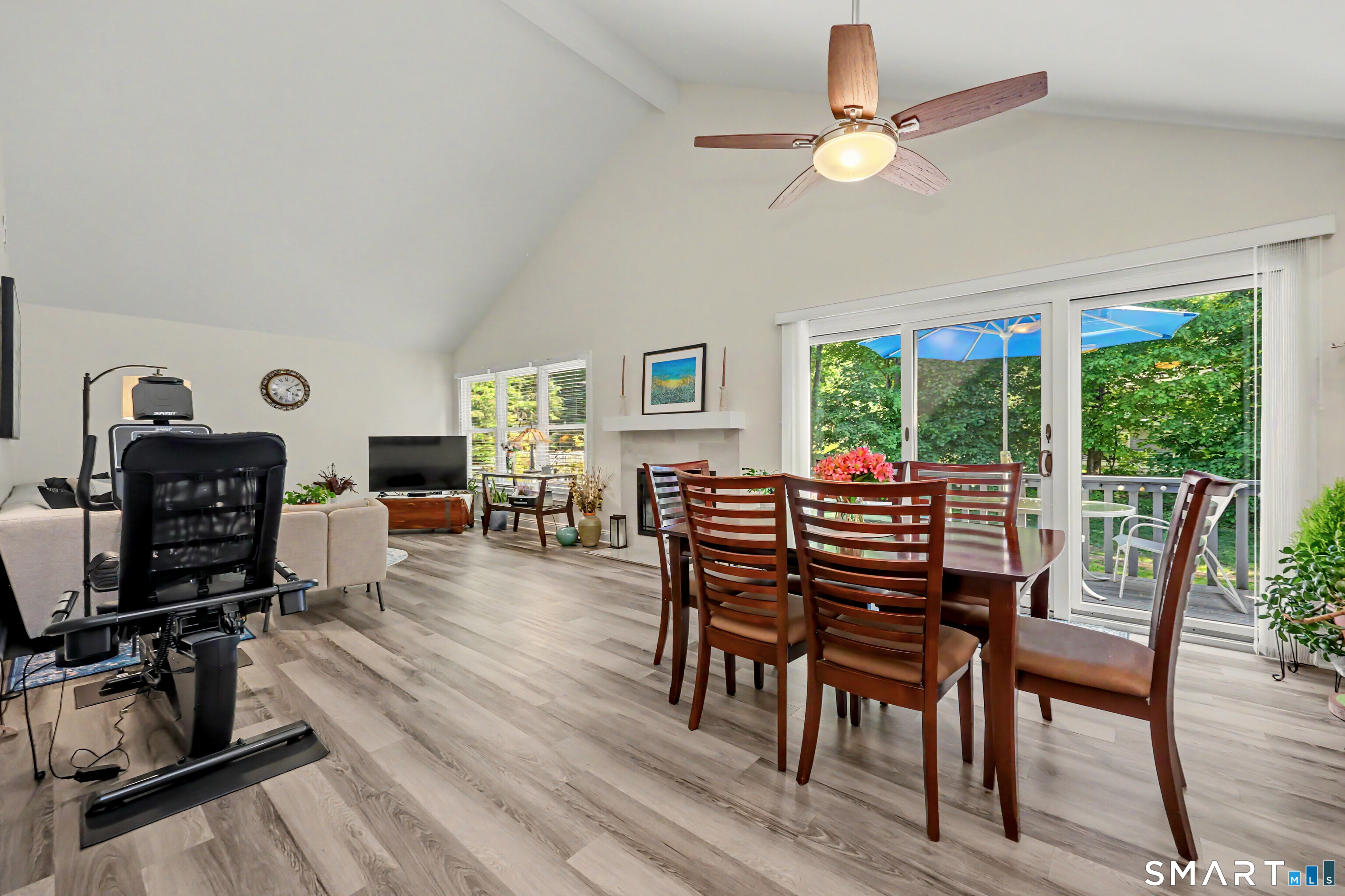 70 Fawn Ridge Lane, Unit 70 Norwalk, CT 06851 - Photo 5 of 36 a view of a dining room with furniture window and outside view