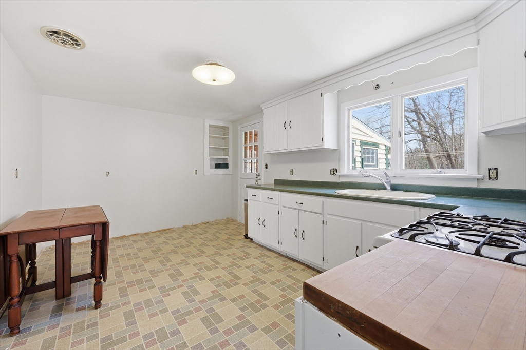 240 Upper Road Deerfield, MA 01342 - Photo 19 of 42 a kitchen that has a sink and a stove in it