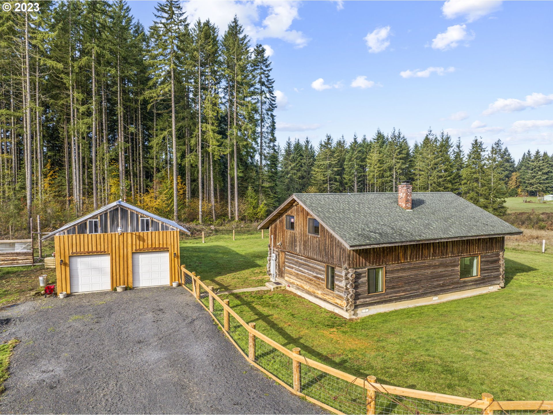 282 Hewitt Road Chehalis, WA 98532 - Photo 4 of 25 a aerial view of a house with swimming pool and a yard