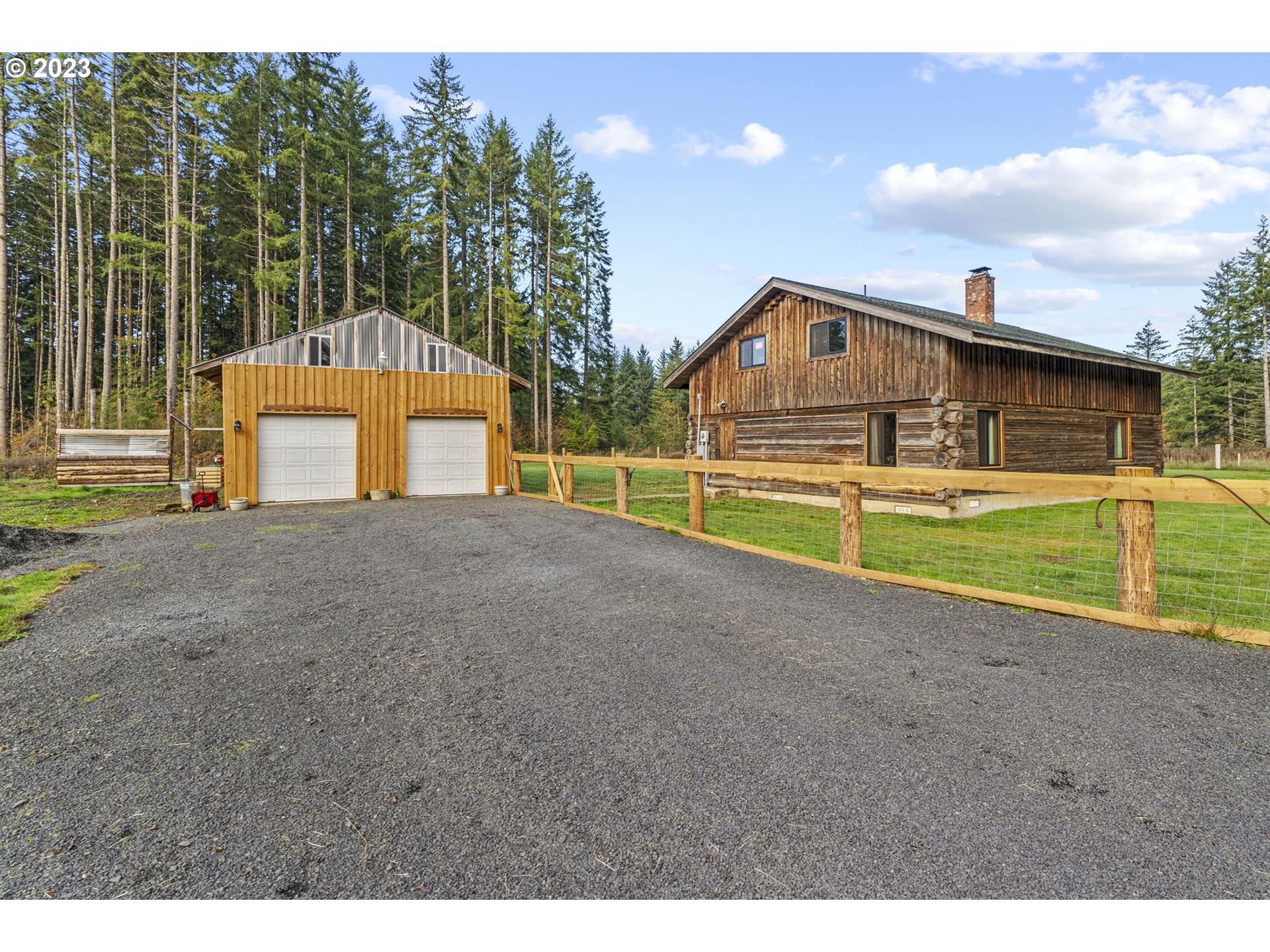 282 Hewitt Road Chehalis, WA 98532 - Photo 5 of 25 a front view of a house with a yard and garage