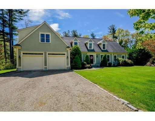 32 Olde Sheepfield Road Marion, MA 02738 - Photo 35 of 41 a front view of a house with a yard and garage