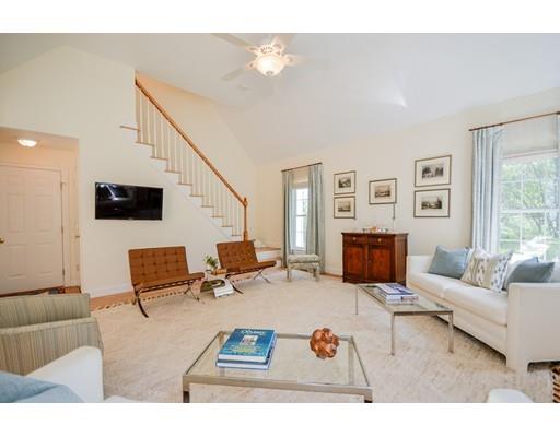 32 Olde Sheepfield Road Marion, MA 02738 - Photo 5 of 41 a living room with furniture and a flat screen tv