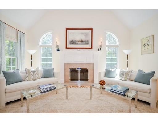 32 Olde Sheepfield Road Marion, MA 02738 - Photo 8 of 41 a living room with furniture and a fireplace