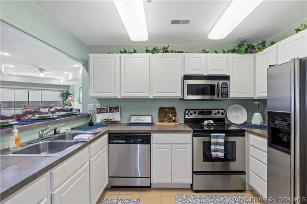 $300,000 | 116 Emerald Bay Drive, Unit 2C, Lake Ozark, MO 65049