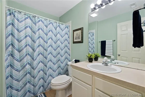 $300,000 | 116 Emerald Bay Drive, Unit 2C, Lake Ozark, MO 65049