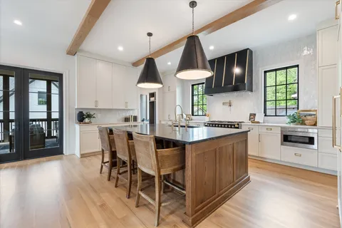 a kitchen with a sink and cabinets