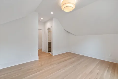 a view of a house with pool and a yard