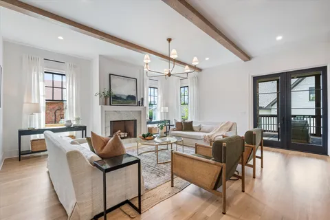 a kitchen with a table and chairs in it