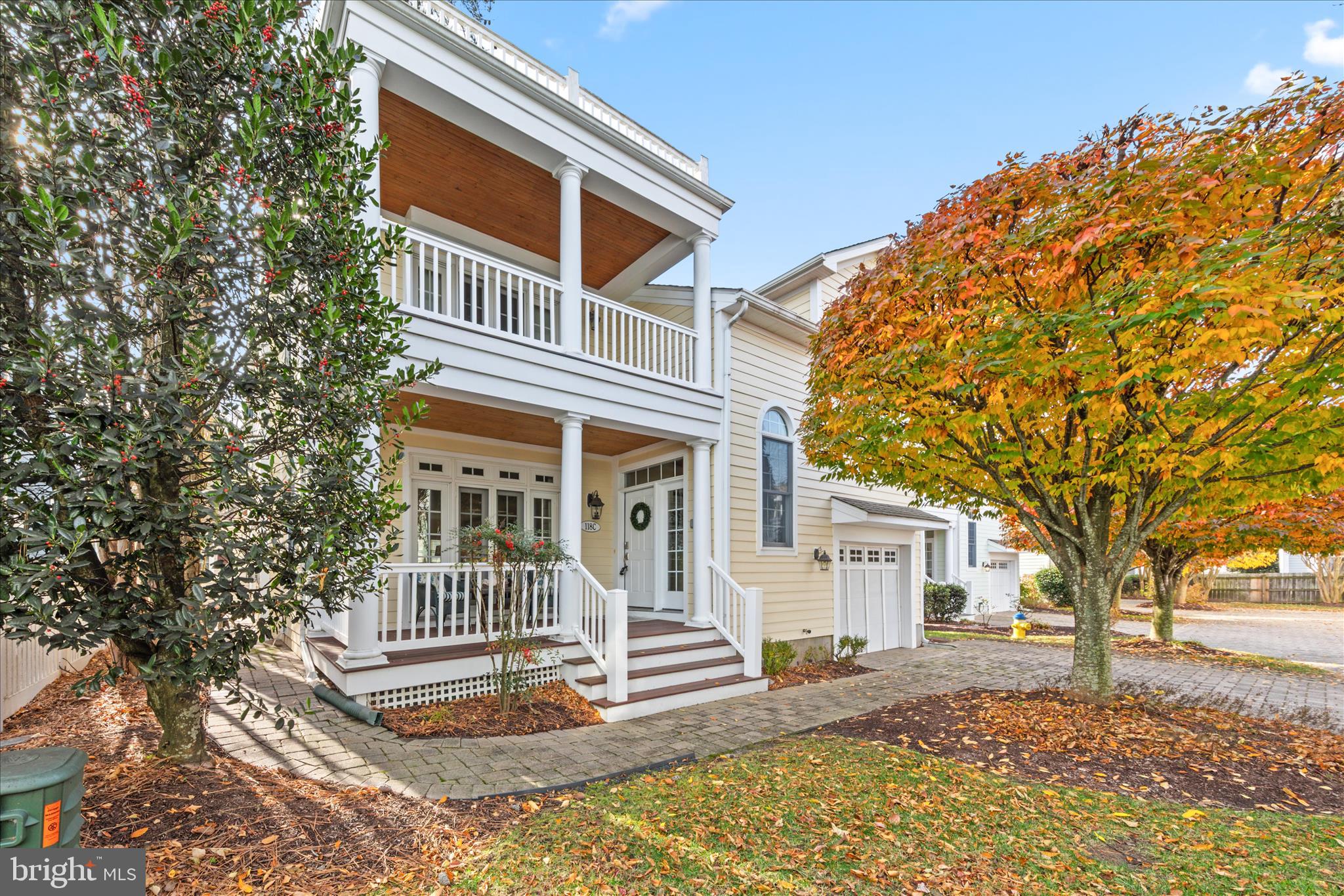 front view of a house with a trees