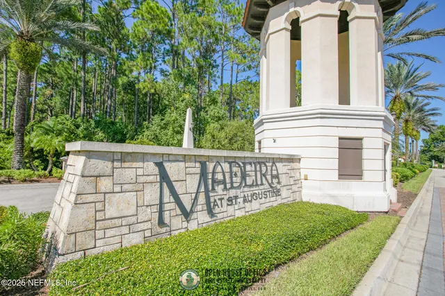 a room with gym equipment and a large window