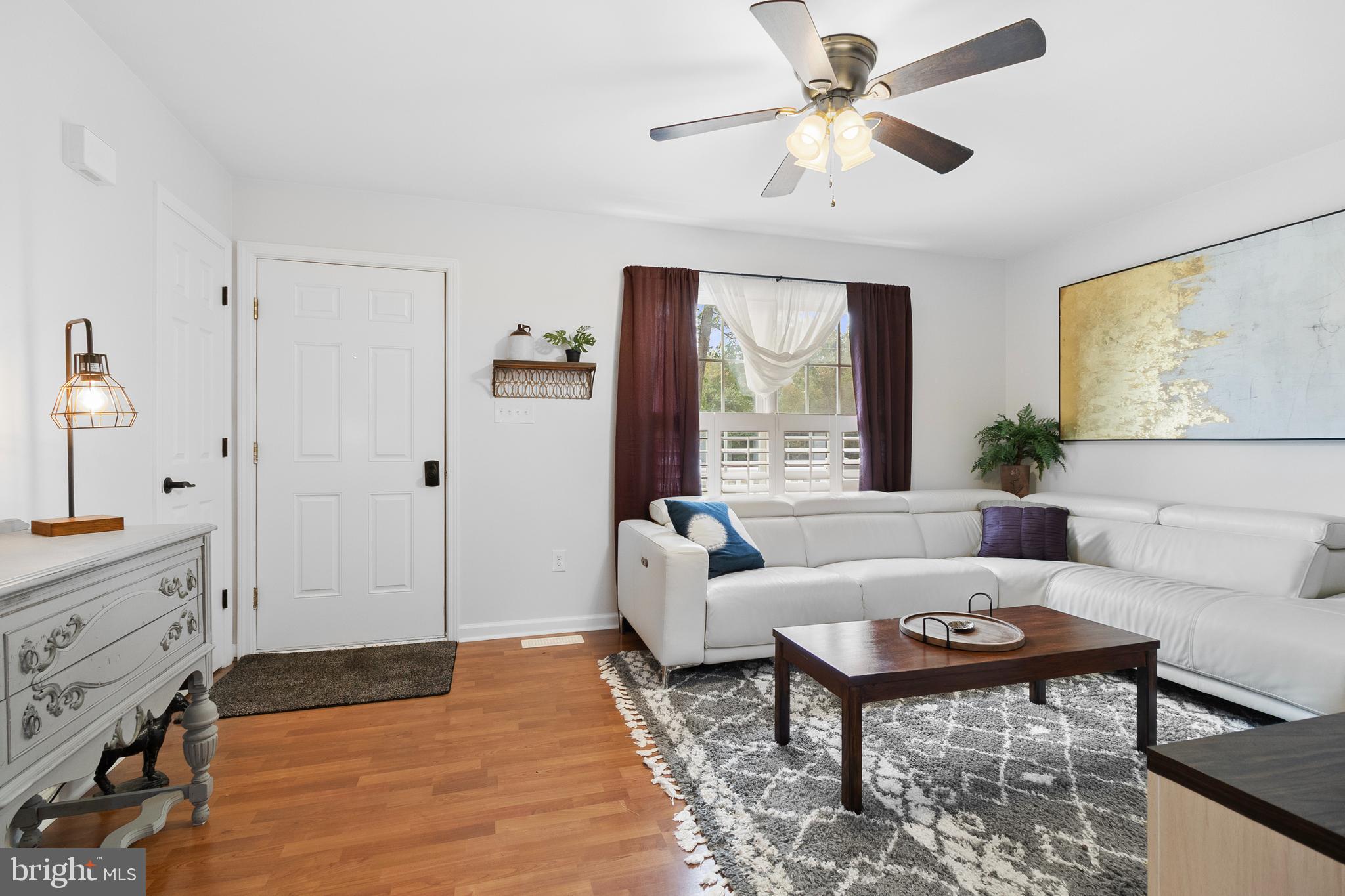 19821 Foggy Bottom Road Bluemont, VA 20135 - Photo 22 of 92 a living room with furniture and a chandelier