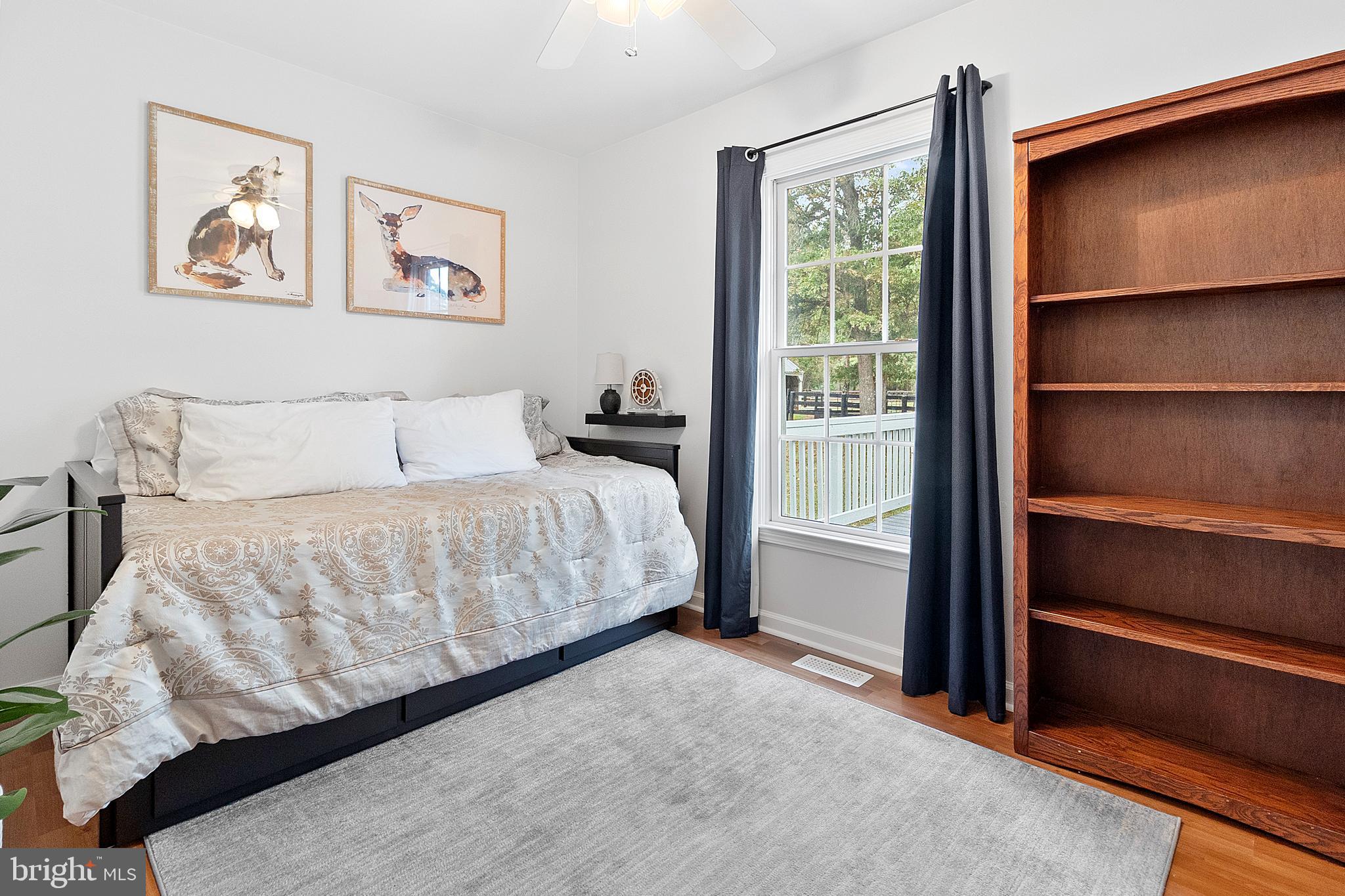 19821 Foggy Bottom Road Bluemont, VA 20135 - Photo 25 of 92 a bedroom with a bed and painting on the wall