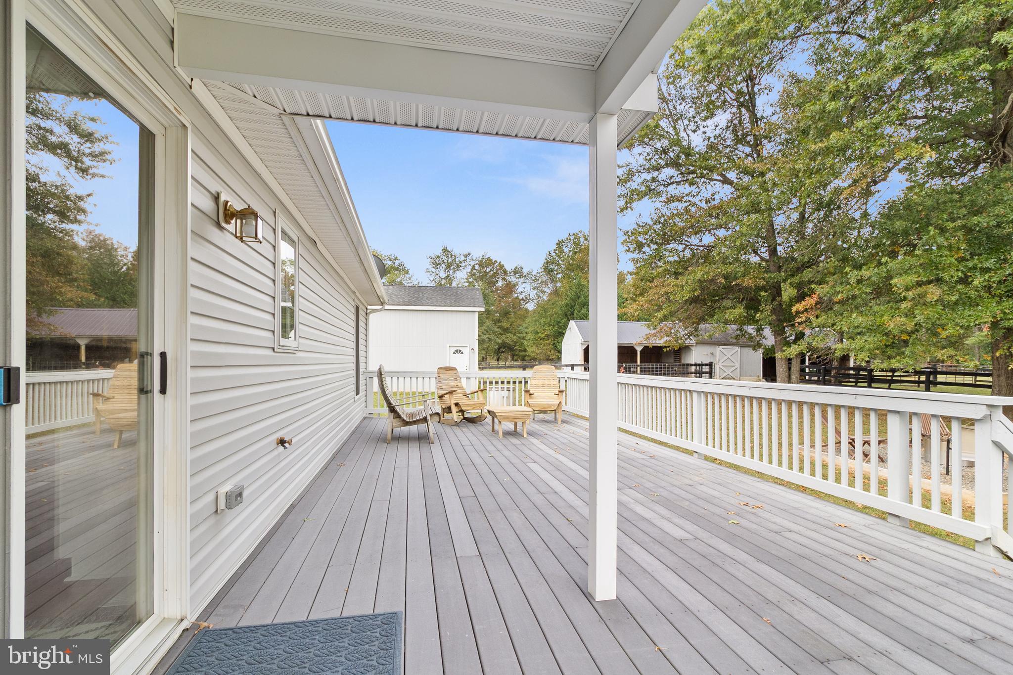 19821 Foggy Bottom Road Bluemont, VA 20135 - Photo 39 of 92 a view of balcony with wooden floor and seating space