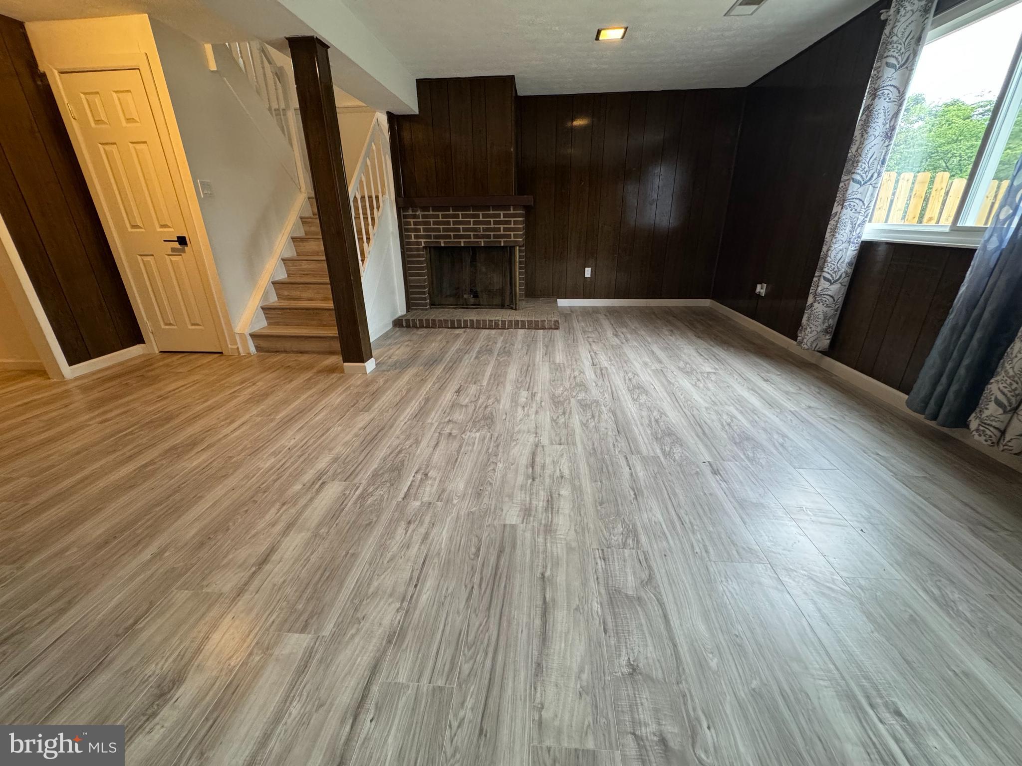 1757 Carriage Way Frederick, MD 21702 - Photo 33 of 42 wooden floor in an empty room with a window