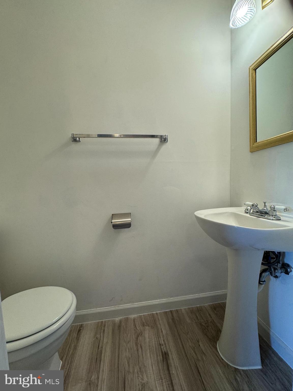 1757 Carriage Way Frederick, MD 21702 - Photo 34 of 42 a bathroom with a sink a toilet and shower