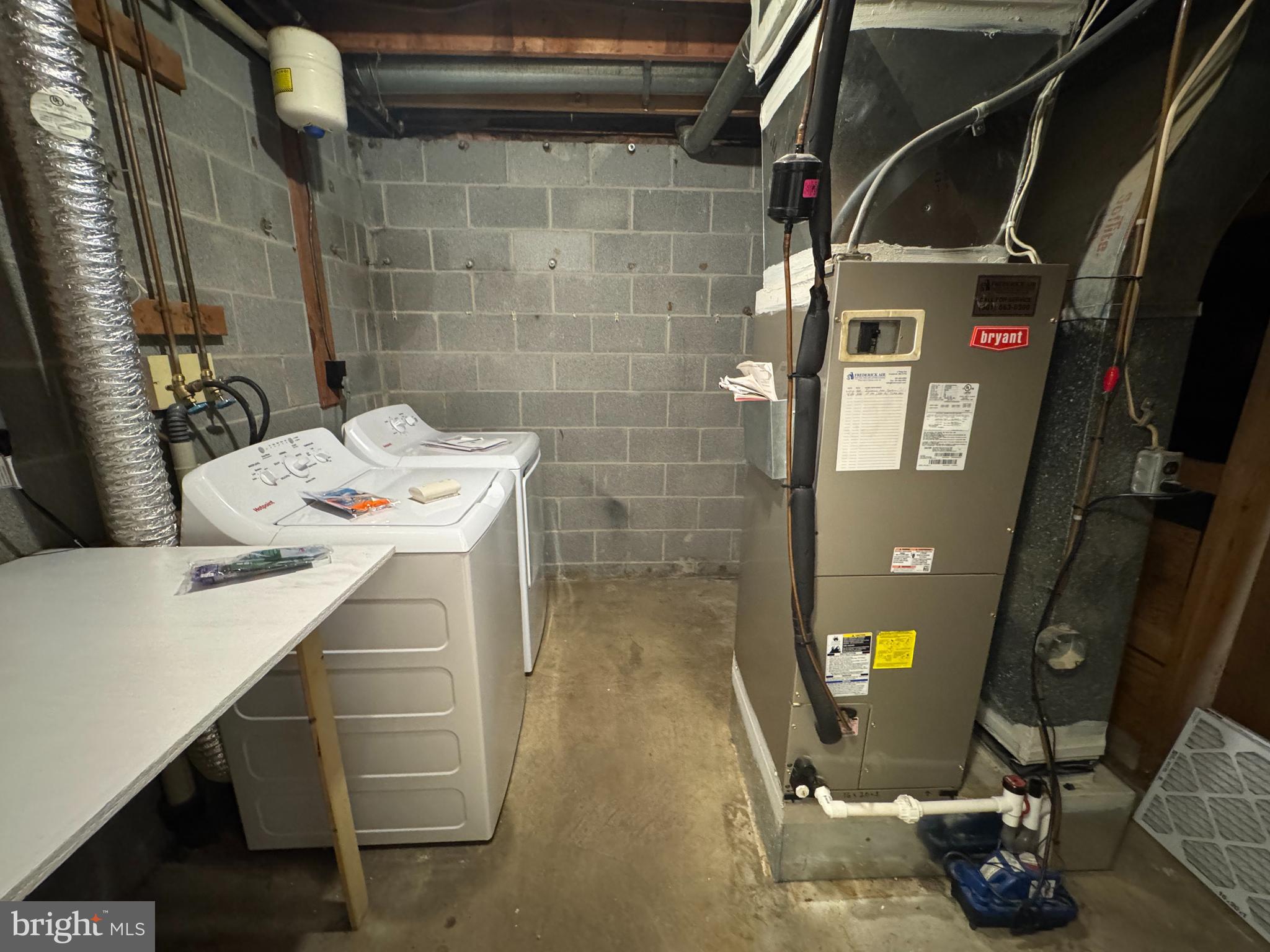 1757 Carriage Way Frederick, MD 21702 - Photo 39 of 42 a utility room with dryer and washer