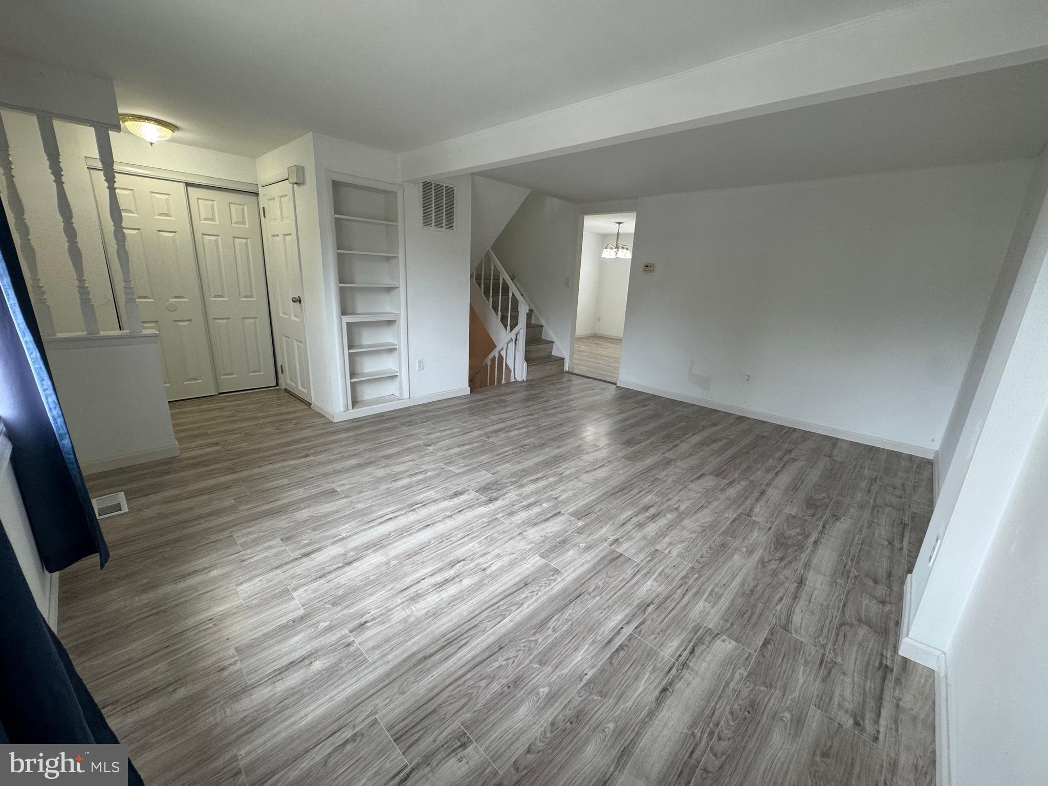 1757 Carriage Way Frederick, MD 21702 - Photo 10 of 42 a view of empty room with wooden floor