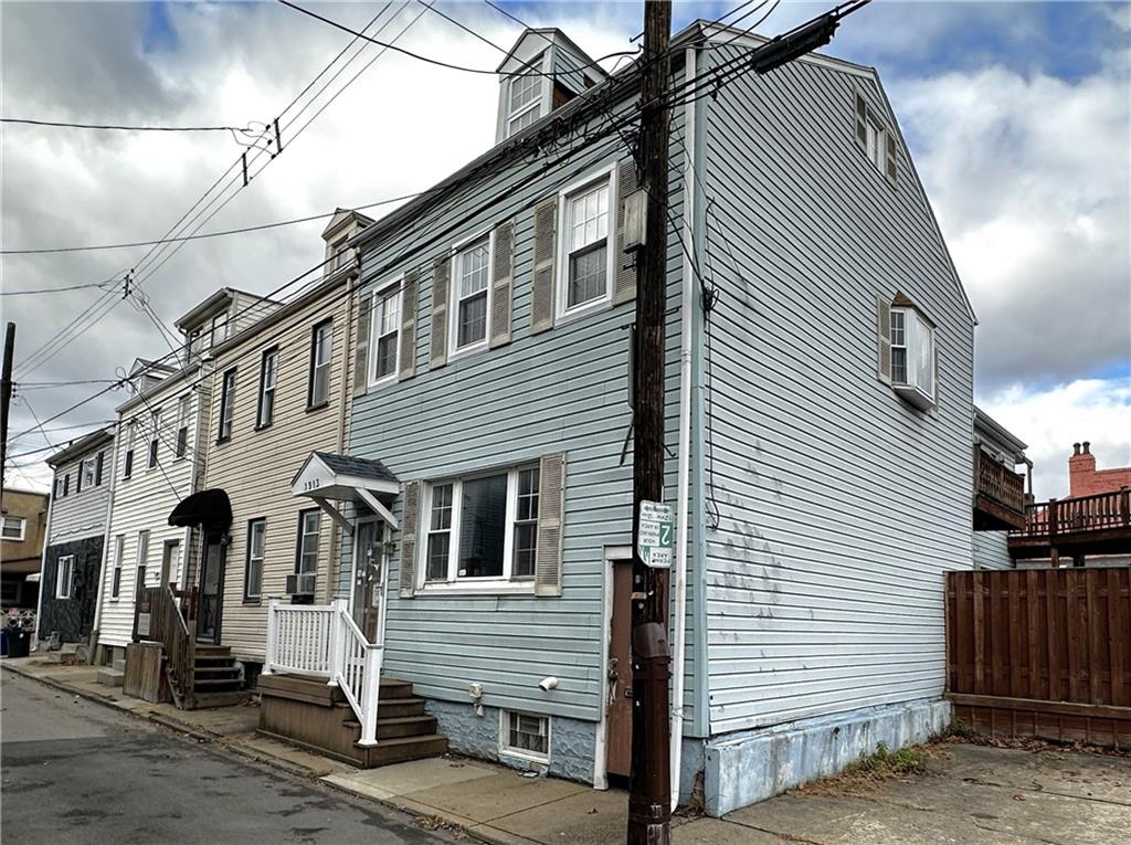 1913 Fox Way Pittsburgh, PA 15203 - Photo 2 of 9 a view of a house with a street