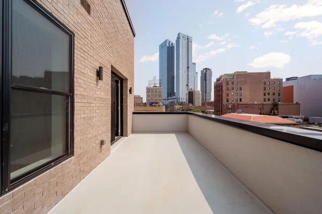 a view of balcony with city view
