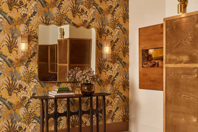 a bathroom with a sink and mirror