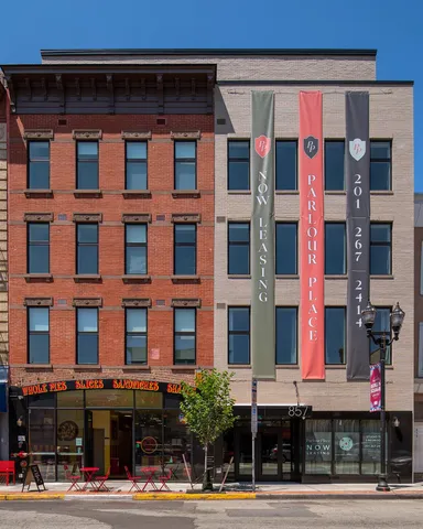 a view of a building and a street