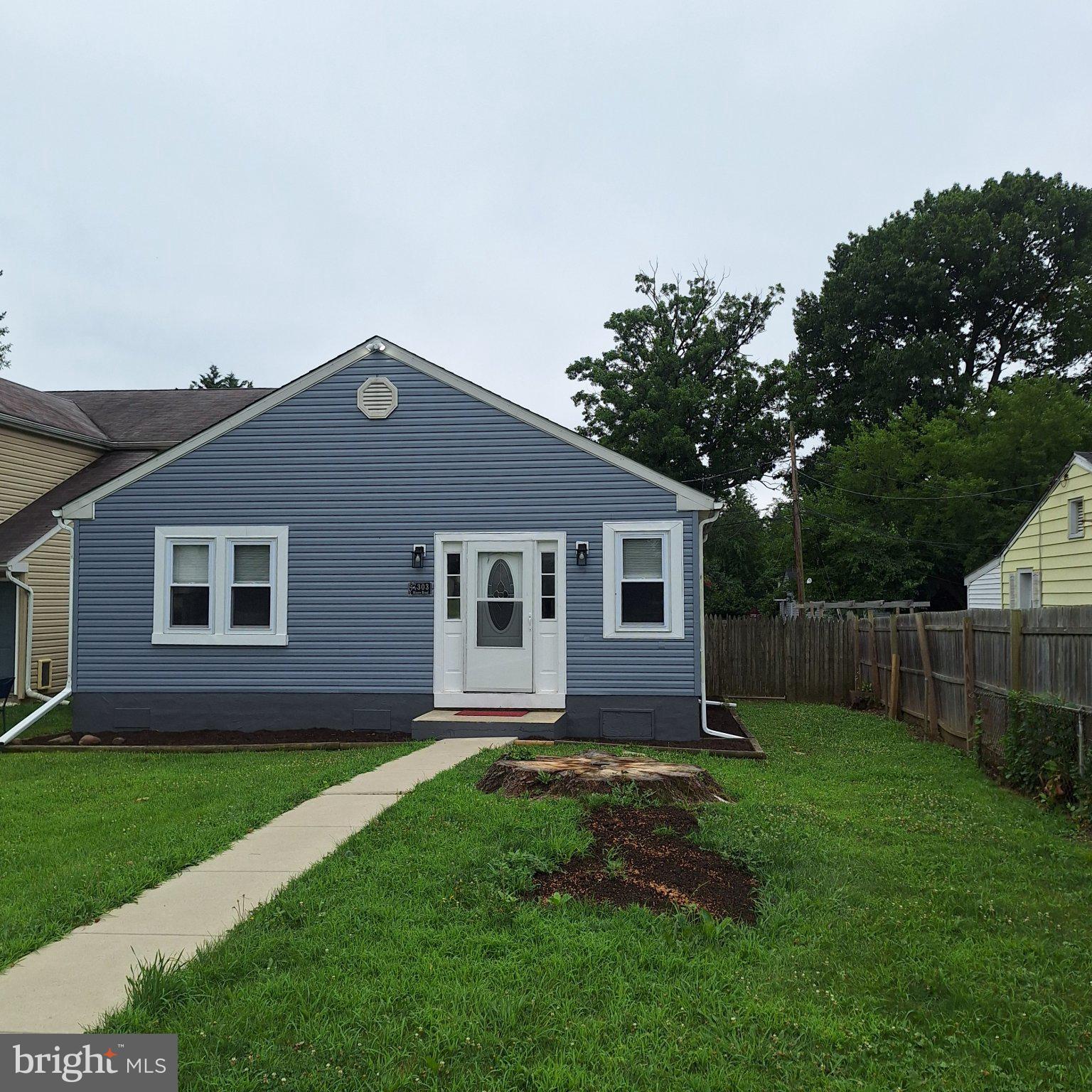 303 Moore Road Wallingford, PA 19086 - Photo 1 of 22 Charming blue home with lush yard.