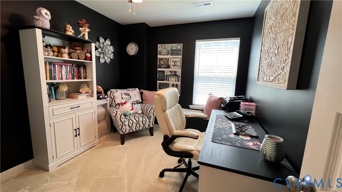 223 Whiteside Road Sandston, VA 23150 - Photo 17 of 22 Versatile room featuring dark painted walls and li